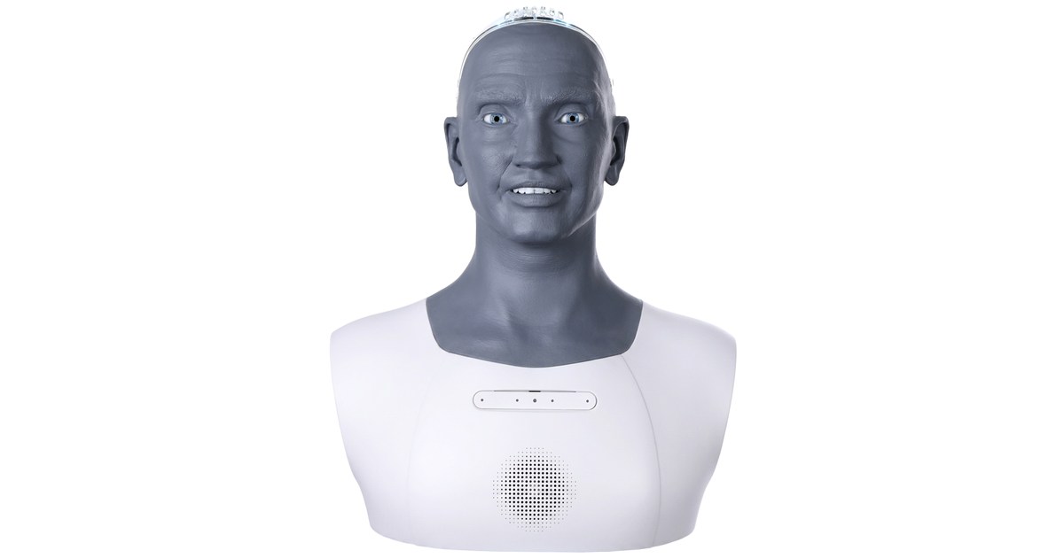 Azi Desktop Gen 3 con rostro gris y carcasa blanca en una fotografía oficial