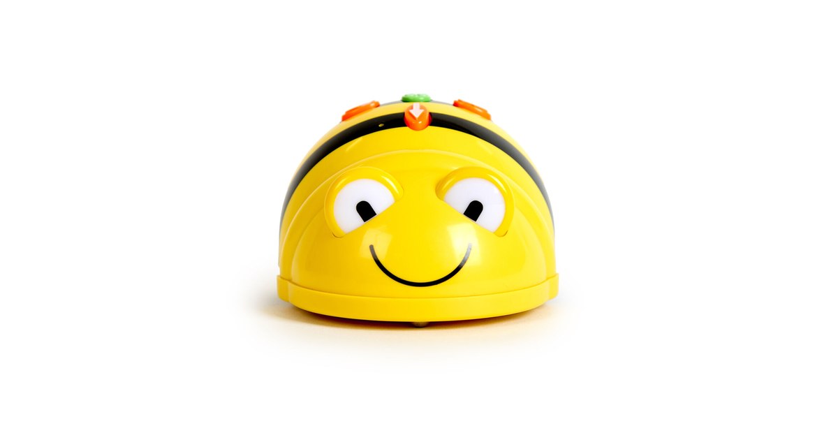 Fotografía oficial del robot educativo Bee-Bot amarillo de TTS, visto desde arriba y de perfil.