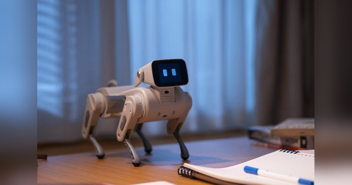 Imagen promocional oficial de Gogobot D1 completo, con cuatro patas articuladas y pantalla facial, sobre un escritorio.