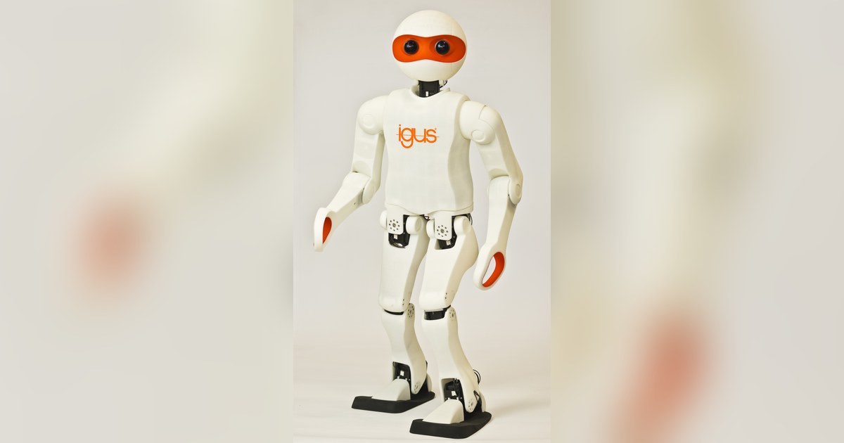igus Humanoid Open Platform, de cuerpo entero, con carcasa blanca y rostro naranja.