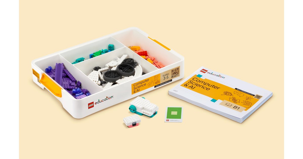 Caja abierta del kit LEGO Education Computer Science & AI 45521 con piezas y componentes