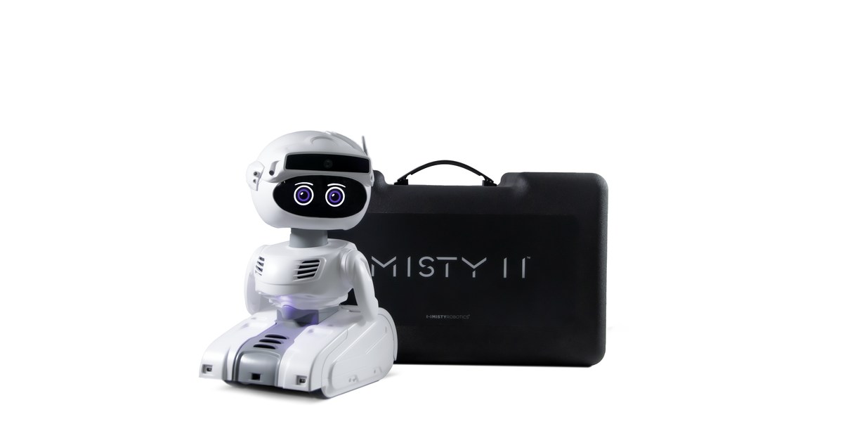 Imagen oficial de Misty II blanco, completo y junto a su maletín negro de transporte.