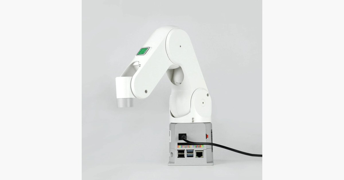 Imagen oficial del myPalletizer 260 Pi blanco, con su estructura articulada y el cable conectado a la base.