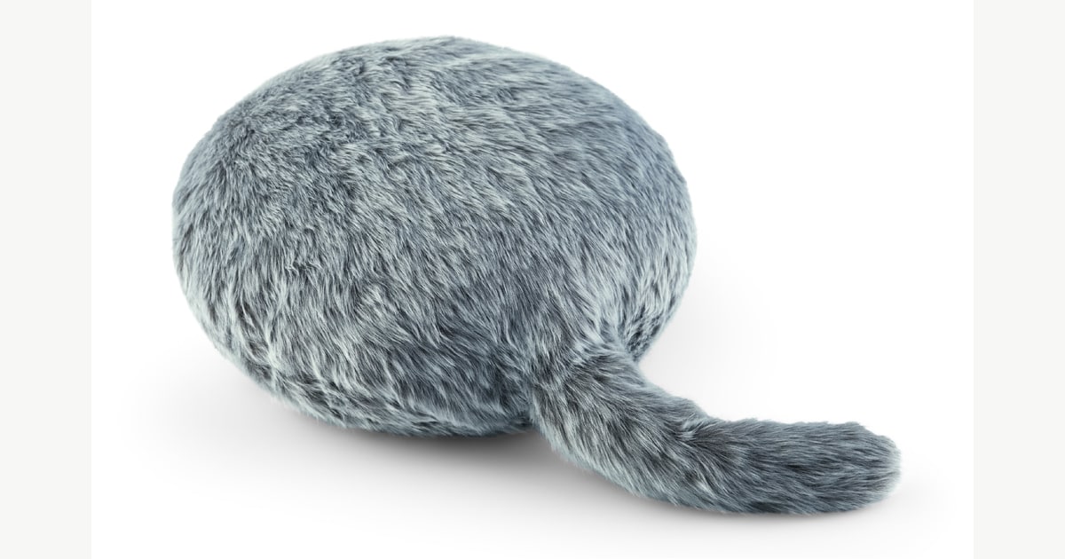 Cojín Qoobo de color gris con su cola robótica extendida
