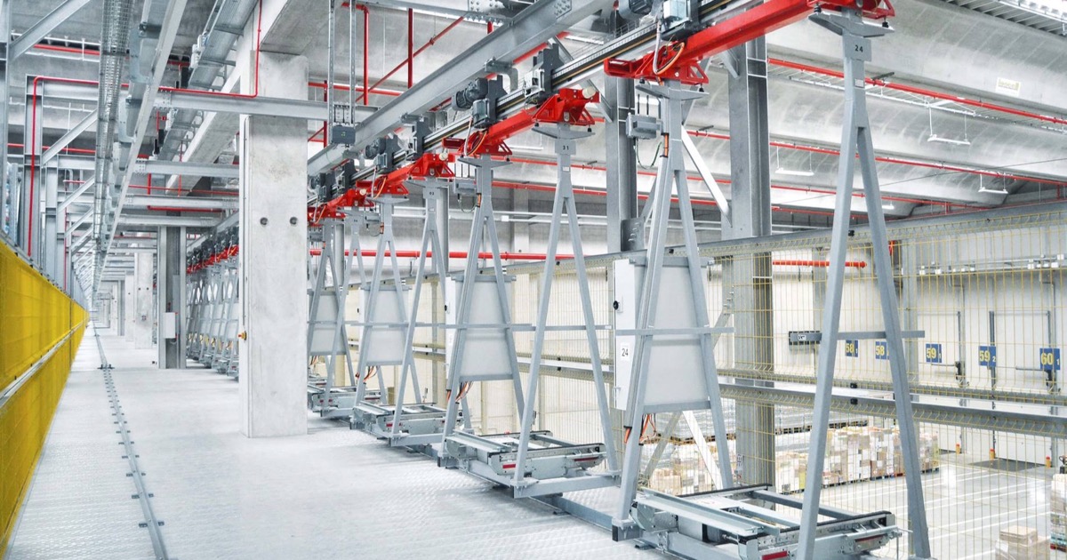Swisslog rebautiza su monorraíl para mover 600 palés/hora