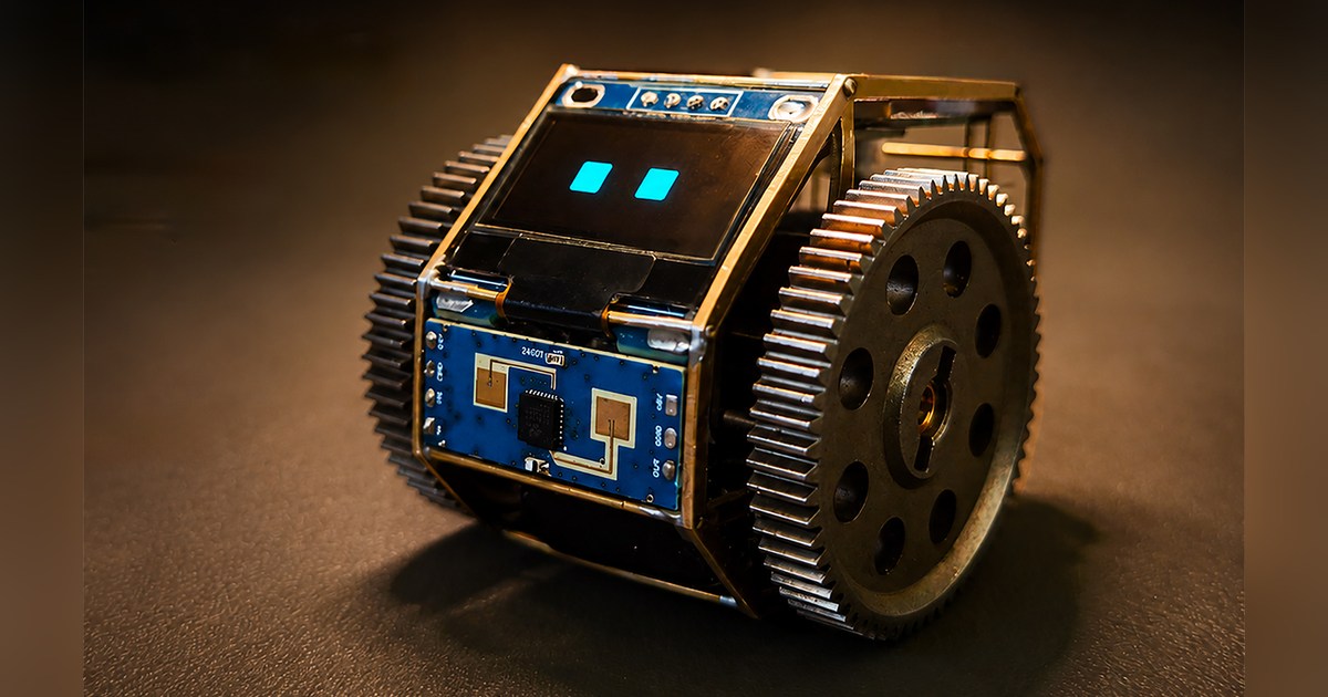 Fotografía oficial del prototipo TongDou V9 con ojos azules en su pantalla, estructura de latón, electrónica expuesta y dos ruedas dentadas.