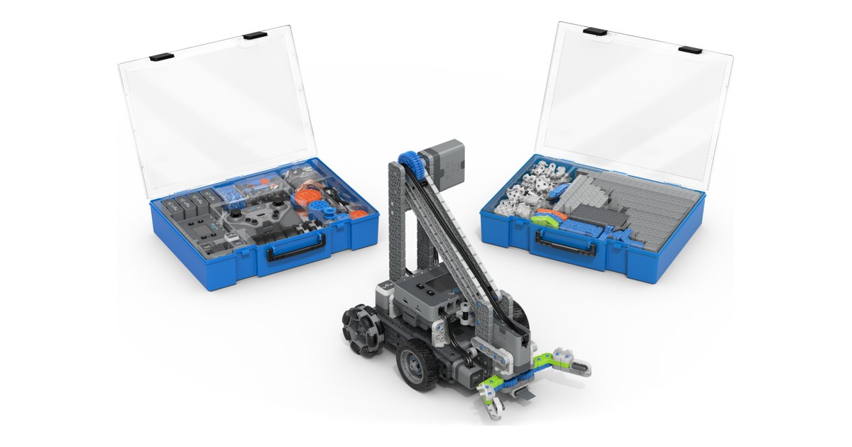 Clawbot de VEX IQ de segunda generación junto a piezas y cajas del Education Kit