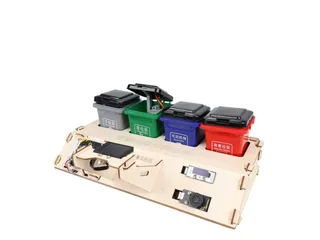 Imagen oficial del tablero Waste Sorting Robot con cámara y contenedores de colores.