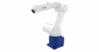 Fotografía del DENSO VM-60B1 completo, extraída del catálogo oficial; conserva base y brida.