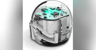 Robot Ozobot Bit+ transparente visto de cerca sobre fondo claro