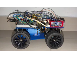 Fotografía de Encore V2 de su coche robot completo visto de lado, con estructura azul, cuatro ruedas y ultrasonidos.