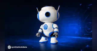 Imagen promocional oficial de JBR-001 completo, con cuerpo blanco y azul, cabeza con cámara y brazos, sobre fondo azul.