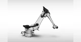 Imagen oficial del robot industrial Comau NJ-60-2.2 completo.