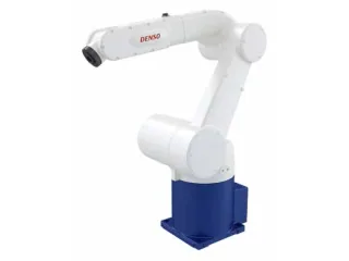 Fotografía del DENSO VM-60B1 completo, extraída del catálogo oficial; conserva base y brida.