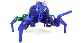 Hexápodo Vorpal azul y verde de cuerpo completo con una pata levantada.