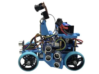 Fotografía del equipo Superiores de su coche robot completo, con chasis azul impreso, cuatro ruedas y cámara elevada.