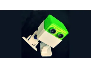 Fotografía oficial de un Otto DIY montado, con cabeza verde translúcida, sensor ultrasónico frontal, cuerpo y pies blancos sobre fondo oscuro.