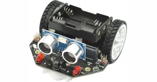 Maqueen Lite de DFRobot con chasis negro, dos ruedas y módulo ultrasónico frontal, sin placa micro:bit instalada