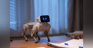 Imagen promocional oficial de Gogobot D1 completo, con cuatro patas articuladas y pantalla facial, sobre un escritorio.