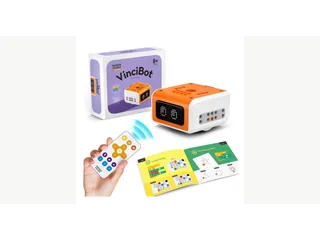 VinciBot con el mando, el rotulador y los materiales de su kit de programación