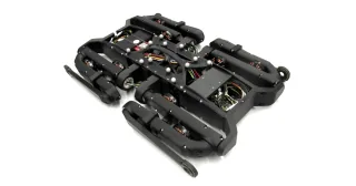 Fotografía oficial de Solo12 con las patas plegadas, publicada por Open Dynamic Robot Initiative.