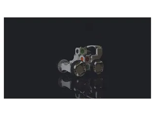 Construcción robótica MOSS con bloques, motores y ruedas sobre un fondo oscuro.