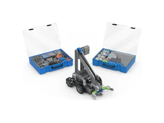 Clawbot de VEX IQ de segunda generación junto a piezas y cajas del Education Kit