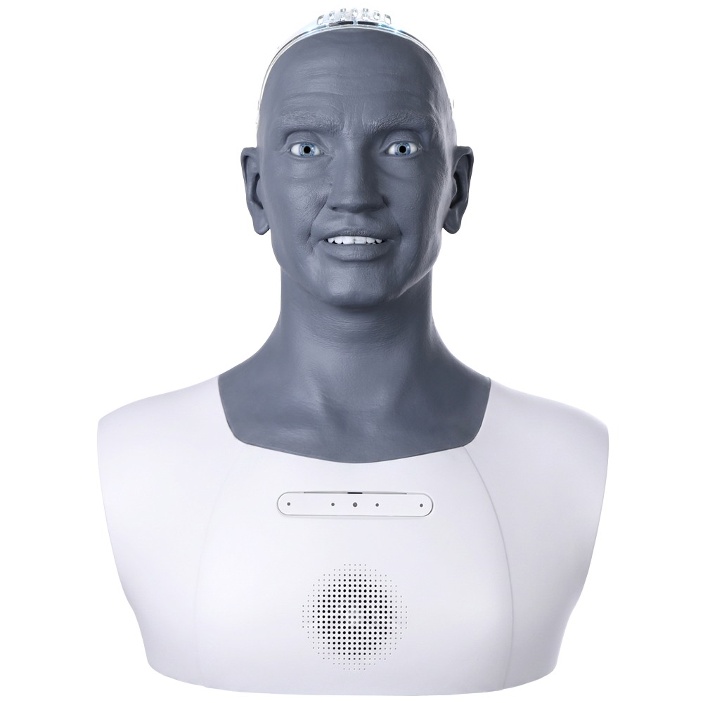 Azi Desktop Gen 3 con rostro gris y carcasa blanca en una fotografía oficial