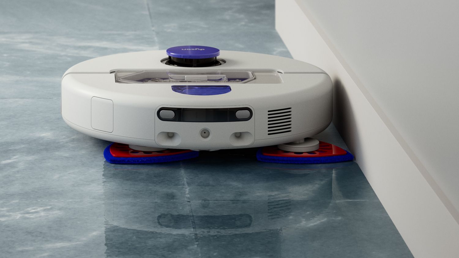 Fotografía oficial del Dyson R2 Nurovi Wash+Dry blanco fregando junto a una pared, con las dos mopas triangulares visibles.