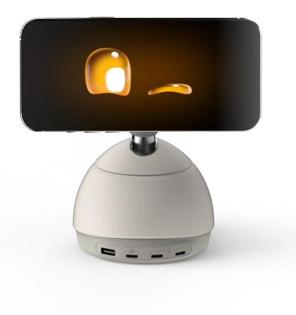 Imagen oficial de Loona Deskmate Studio White con un iPhone horizontal mostrando ojos amarillos.