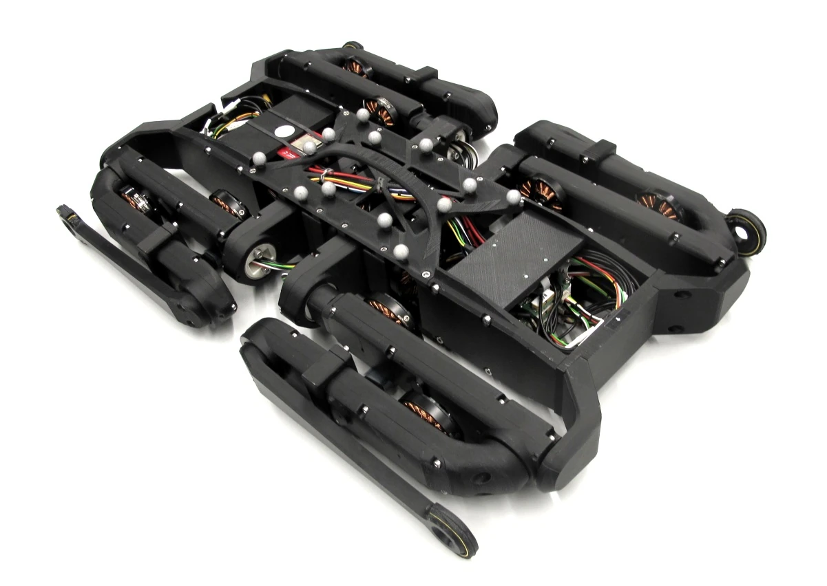 Fotografía oficial de Solo12 con las patas plegadas, publicada por Open Dynamic Robot Initiative.